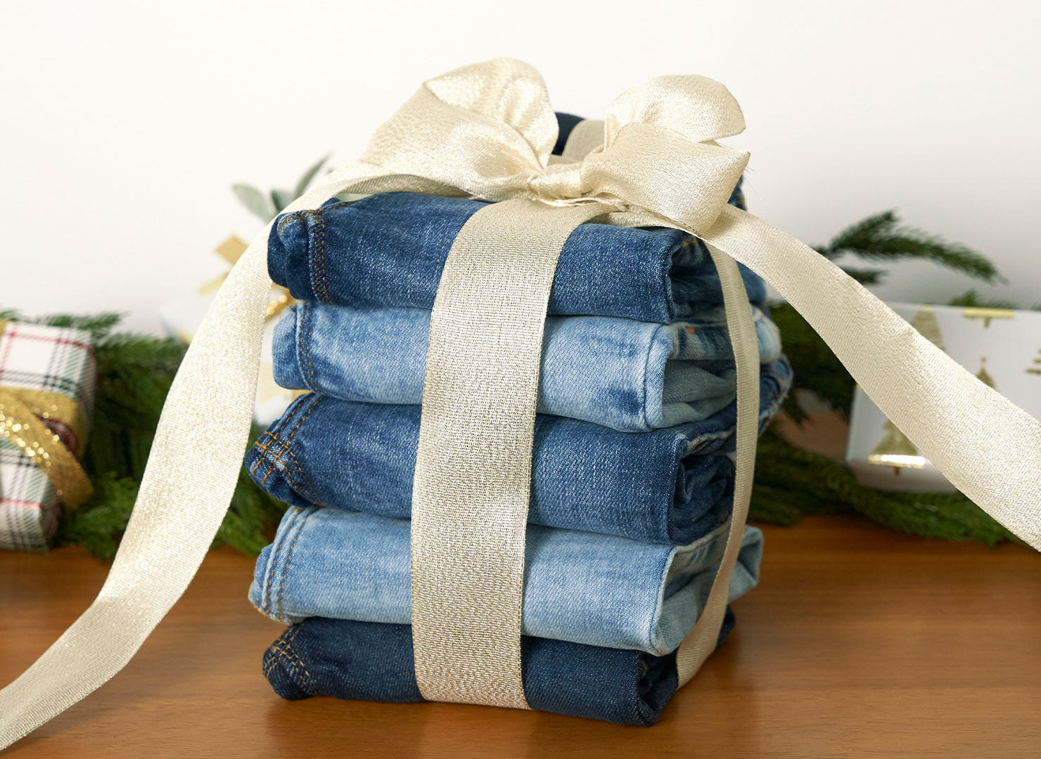 Christmas jeans in a stack ready for Santa